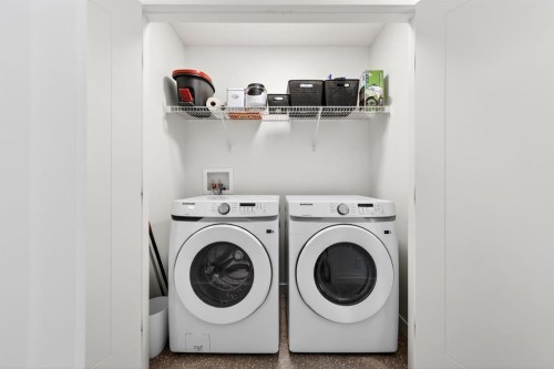 10 Currie Walk Sw, Calgary, AB - Indoor Photo Showing Laundry Room