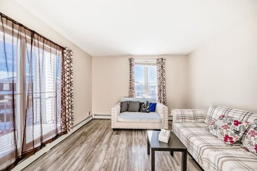 2202-333 Taravista Drive Ne, Calgary, AB - Indoor Photo Showing Living Room
