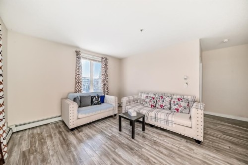 2202-333 Taravista Drive Ne, Calgary, AB - Indoor Photo Showing Living Room