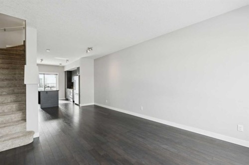 2506 Jumping Pound Common, Cochrane, AB - Indoor Photo Showing Other Room