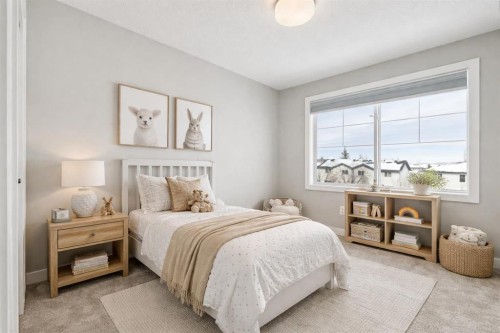 2506 Jumping Pound Common, Cochrane, AB - Indoor Photo Showing Bedroom