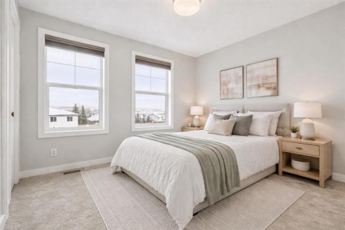 2506 Jumping Pound Common, Cochrane, AB - Indoor Photo Showing Bedroom