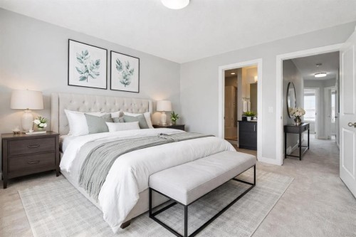 2506 Jumping Pound Common, Cochrane, AB - Indoor Photo Showing Bedroom