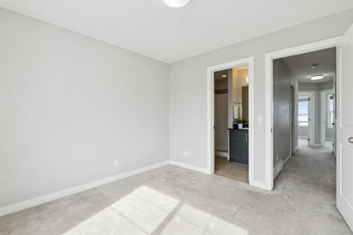 2506 Jumping Pound Common, Cochrane, AB - Indoor Photo Showing Other Room