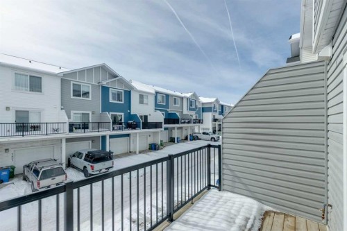 2506 Jumping Pound Common, Cochrane, AB - Outdoor With Balcony With Exterior