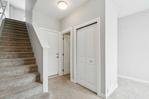 2506 Jumping Pound Common, Cochrane, AB - Indoor Photo Showing Other Room