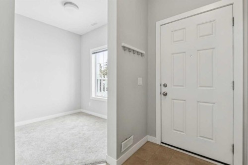 2506 Jumping Pound Common, Cochrane, AB - Indoor Photo Showing Other Room