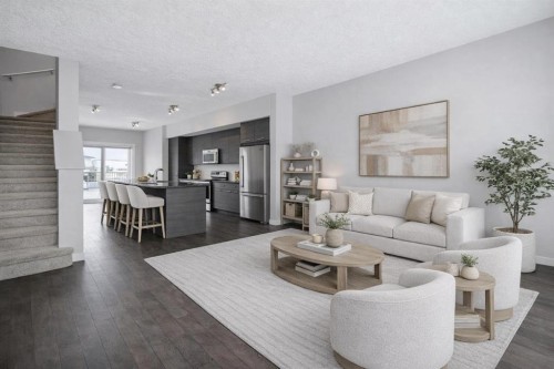 2506 Jumping Pound Common, Cochrane, AB - Indoor Photo Showing Living Room