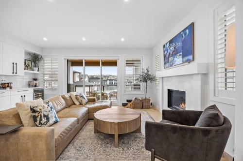 80 Timberline Way Sw, Calgary, AB - Indoor Photo Showing Living Room With Fireplace