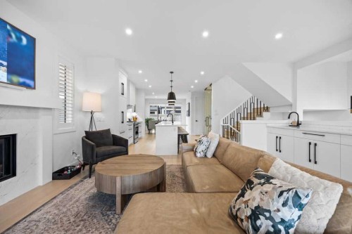 80 Timberline Way Sw, Calgary, AB - Indoor Photo Showing Living Room With Fireplace
