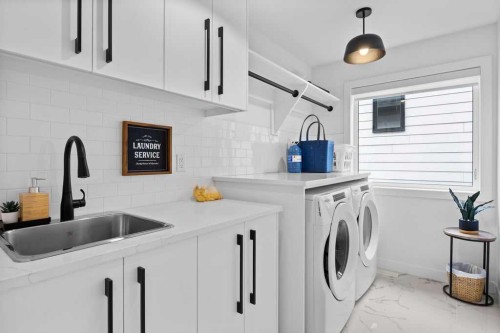 80 Timberline Way Sw, Calgary, AB - Indoor Photo Showing Laundry Room