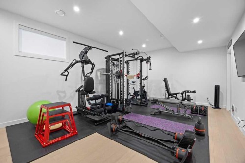 80 Timberline Way Sw, Calgary, AB - Indoor Photo Showing Gym Room