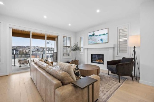 80 Timberline Way Sw, Calgary, AB - Indoor Photo Showing Living Room With Fireplace