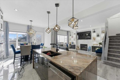 73 Saddleland Close Ne, Calgary, AB - Indoor Photo Showing Other Room With Fireplace