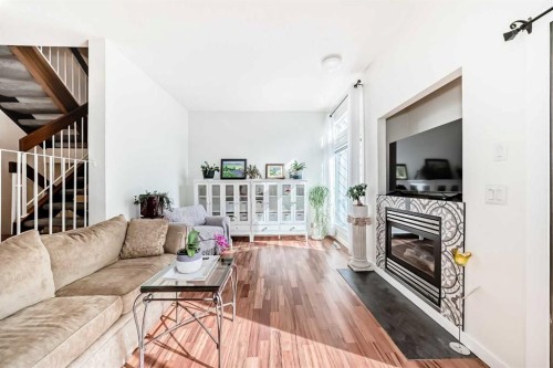 200 Edgemont Estates Drive Nw, Calgary, AB - Indoor Photo Showing Living Room With Fireplace