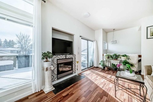 200 Edgemont Estates Drive Nw, Calgary, AB - Indoor Photo Showing Other Room With Fireplace