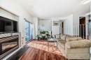 200 Edgemont Estates Drive Nw, Calgary, AB  - Indoor Photo Showing Living Room With Fireplace 