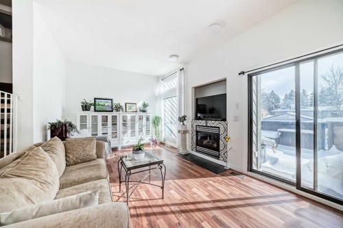 200 Edgemont Estates Drive Nw, Calgary, AB - Indoor Photo Showing Living Room With Fireplace