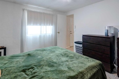 93 Huntstrom Drive Ne, Calgary, AB - Indoor Photo Showing Bedroom