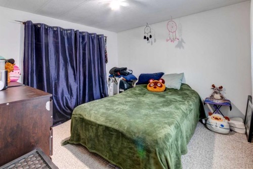 93 Huntstrom Drive Ne, Calgary, AB - Indoor Photo Showing Bedroom