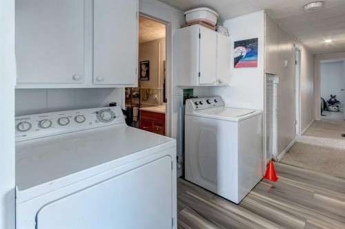93 Huntstrom Drive Ne, Calgary, AB - Indoor Photo Showing Laundry Room