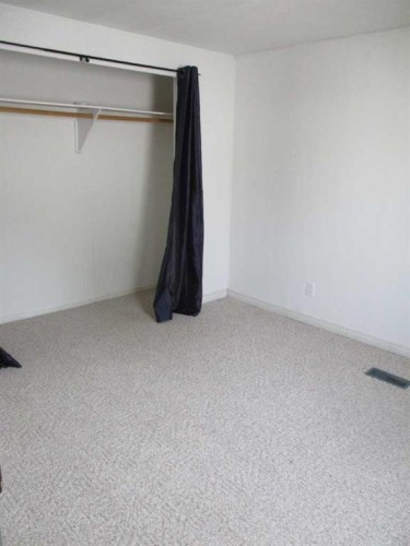 93 Huntstrom Drive Ne, Calgary, AB - Indoor Photo Showing Other Room