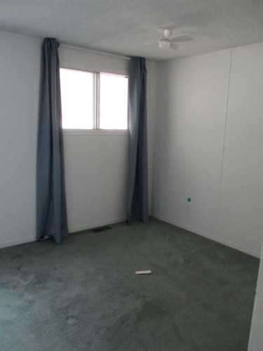 93 Huntstrom Drive Ne, Calgary, AB - Indoor Photo Showing Other Room