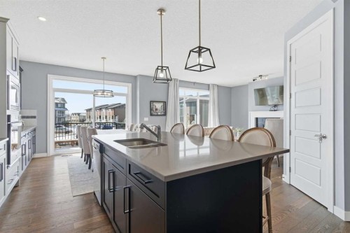 12 Ranchers Bay, Okotoks, AB - Indoor Photo Showing Kitchen With Double Sink With Upgraded Kitchen