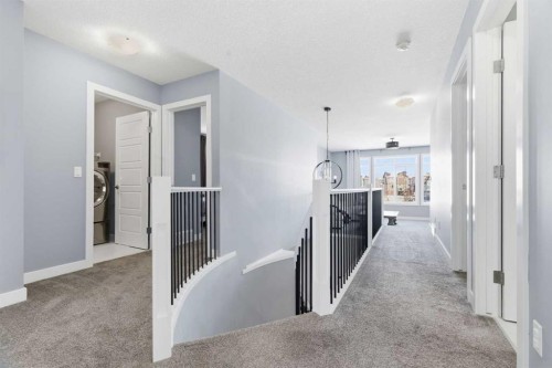 12 Ranchers Bay, Okotoks, AB - Indoor Photo Showing Other Room