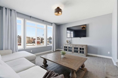 12 Ranchers Bay, Okotoks, AB - Indoor Photo Showing Living Room