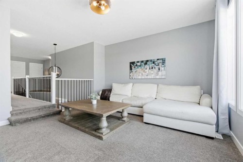 12 Ranchers Bay, Okotoks, AB - Indoor Photo Showing Living Room
