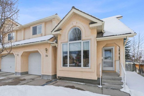 24-26 Quigley Drive  Cochrane, AB T4C 1M2
