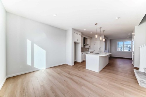 48 Creekside Rise Sw, Calgary, AB - Indoor Photo Showing Other Room