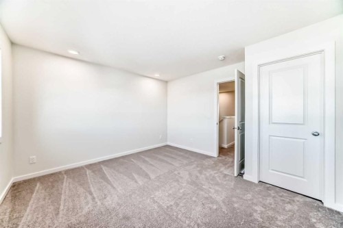 48 Creekside Rise Sw, Calgary, AB - Indoor Photo Showing Other Room