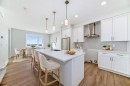 48 Creekside Rise Sw, Calgary, AB  - Indoor Photo Showing Kitchen With Upgraded Kitchen 