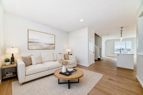 48 Creekside Rise Sw, Calgary, AB - Indoor Photo Showing Living Room
