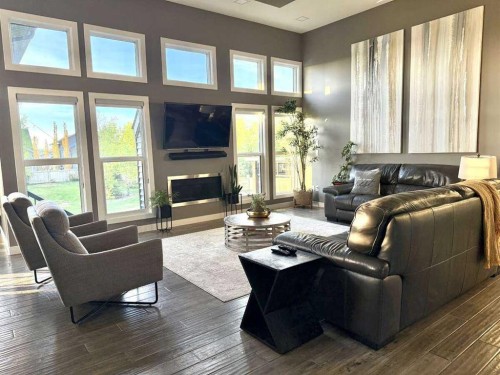 10522 101 Avenue, Sexsmith, AB - Indoor Photo Showing Living Room With Fireplace