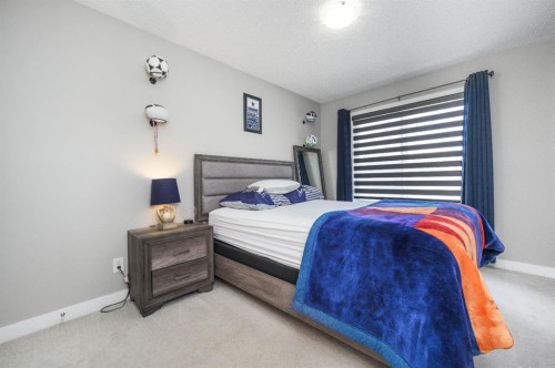 5 Masters Street Se, Calgary, AB - Indoor Photo Showing Bedroom