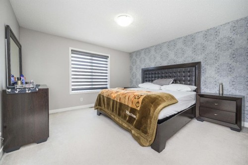 5 Masters Street Se, Calgary, AB - Indoor Photo Showing Bedroom