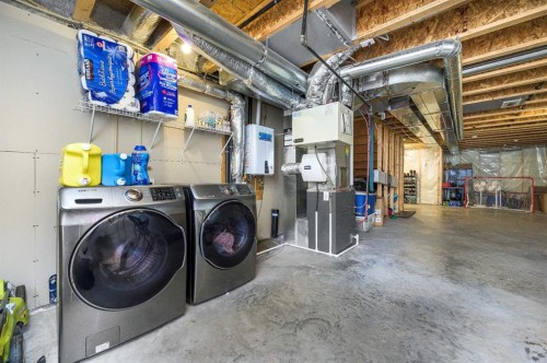 5 Masters Street Se, Calgary, AB - Indoor Photo Showing Laundry Room
