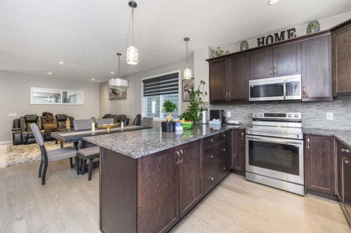 5 Masters Street Se, Calgary, AB - Indoor Photo Showing Kitchen With Upgraded Kitchen