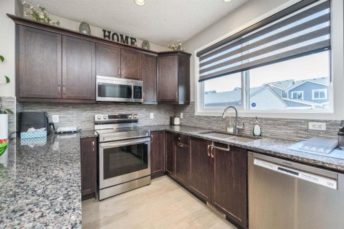 5 Masters Street Se, Calgary, AB - Indoor Photo Showing Kitchen With Upgraded Kitchen