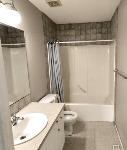 9 Somerside Crescent Sw, Calgary, AB - Indoor Photo Showing Bedroom