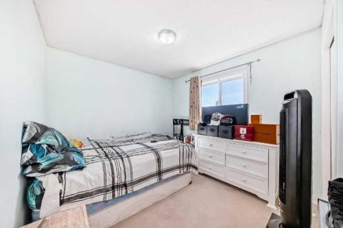 9 Somerside Crescent Sw, Calgary, AB - Indoor Photo Showing Other Room