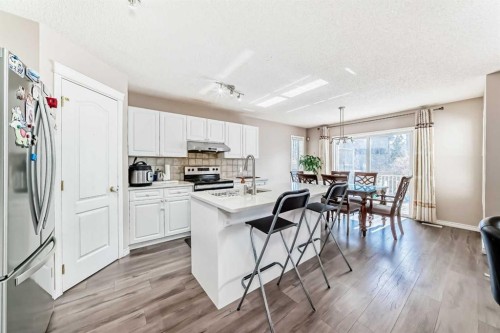 9 Somerside Crescent Sw, Calgary, AB - Indoor Photo Showing Kitchen With Double Sink