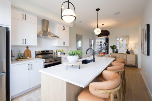 13 Wild Rose Way Se, Calgary, AB - Indoor Photo Showing Kitchen With Upgraded Kitchen