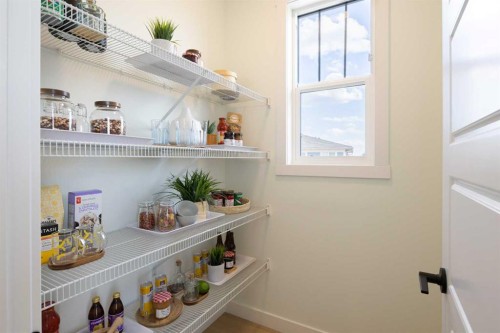 13 Wild Rose Way Se, Calgary, AB - Indoor Photo Showing Other Room