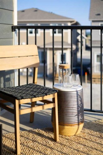 13 Wild Rose Way Se, Calgary, AB - Outdoor With Balcony