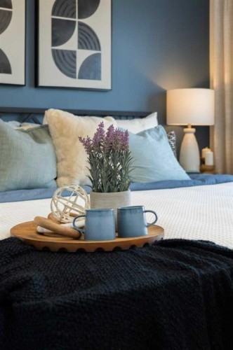 13 Wild Rose Way Se, Calgary, AB - Indoor Photo Showing Bedroom