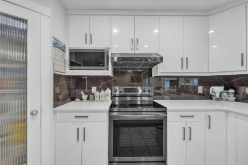 107 Taracove Landing Ne, Calgary, AB - Indoor Photo Showing Kitchen